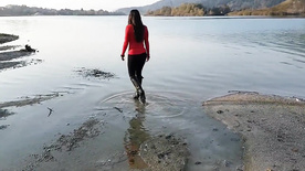 High heeled leather boots in river