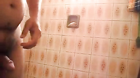 Little boy masturbating in the bathroom