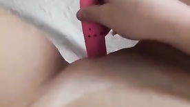 Naughty girl masturbating with a vibrator