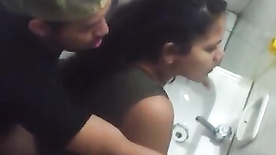 amateur couple caught in the act having sex in a bar bathroom