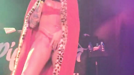 Mc Pipokinha sticking a microphone up her ass during a concert