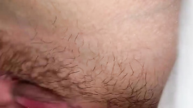 Dog masturbating her hairy pussy until it's very wet