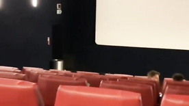 Amateur showing her tits in the movie theater