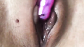Pussy having an orgasm while masturbating with an iron dildo