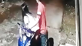 Security camera caught couple fucking on the bike in the street