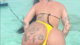 Mc Mirella wiggling her hot ass on the Caribbean beach