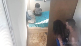 Stepfather fucking his stepdaughter in the hallway while her mother is in the bedroom