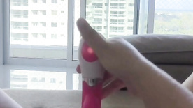 Kelly Tatharsys naked masturbating her pussy on the window with a vibrator