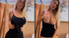 Debora Peixoto tirando o vestido curto e ficando pelada