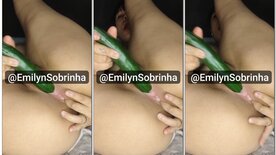 Emilyn Sobrinha punching a cucumber in her pussy