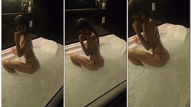 Skinny slut rolling around naked in the Jacuzzi