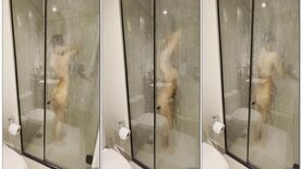Young girl in the shower being filmed by her cousin
