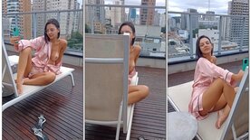 Eduarda Demetrio mostrando os peitos na sacada do prédio