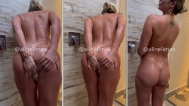 Aline Limas in the shower naked washing her pussy with her ass in the air