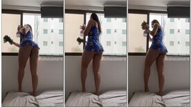 Edna Samara se exibindo enquanto limpa a casa