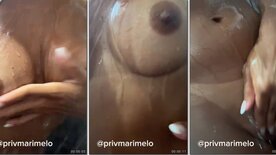 Horny Marinara Melo rubbing her wet pussy in the shower