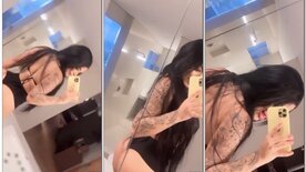 Adah showing off her big, hot ass in front of the mirror