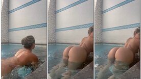 Ani Rocha on all fours in the motel pool