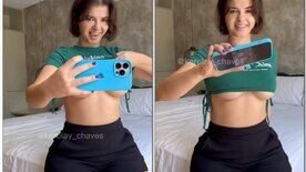 Kerolay Chaves films herself wearing a top showing her breasts and a miniskirt