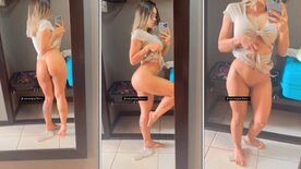 Beautiful blonde Jessica Pacheco showing off her butt and pussy in front of the mirror