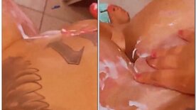 Apitbull hot brunette recording herself soaping up in the shower rubbing her delicious pussy