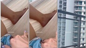 Grazi Mourão fingers her pussy on the building's balcony