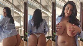 Natali Conti na janela do apartamento com micro calcinha e peitões de fora
