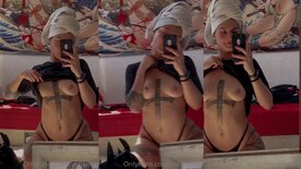 Sassy Svetlanna showing off her pierced breasts in front of the mirror