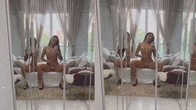 Carla Bora masturbating her pussy in front of the mirror